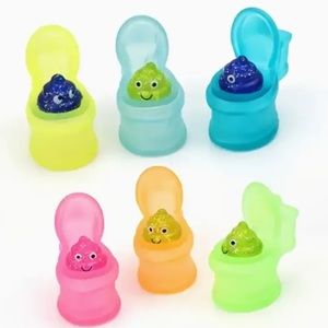 $.50 SQUEEZE TOILET STRESS TOY. 1 AT RANDOM. $.50 WITH ANY $10 ORDER OR MORE
